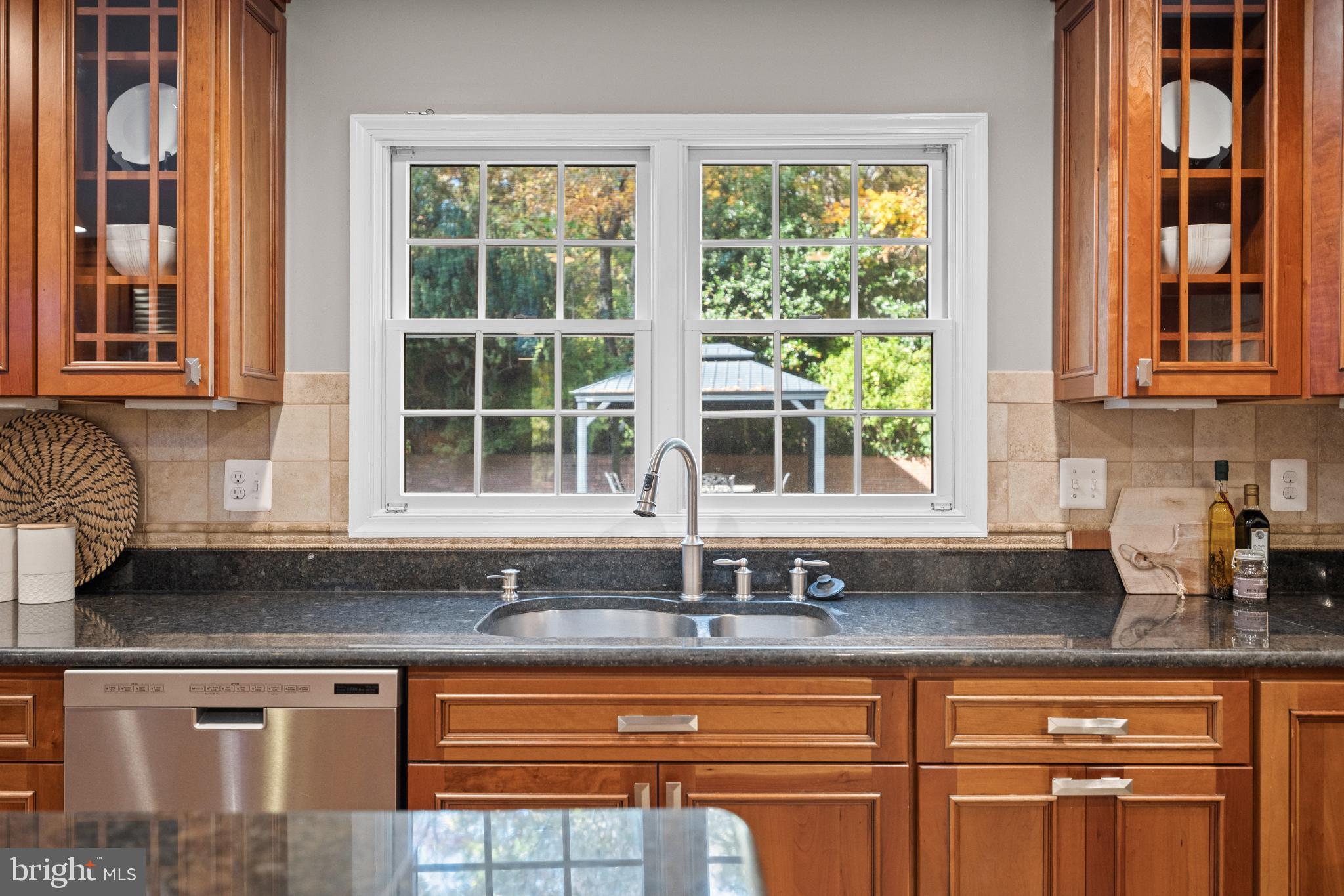 6710 Wemberly Way McLean, VA 22101 - Photo 19 of 46 Bright kitchen with serene garden view
