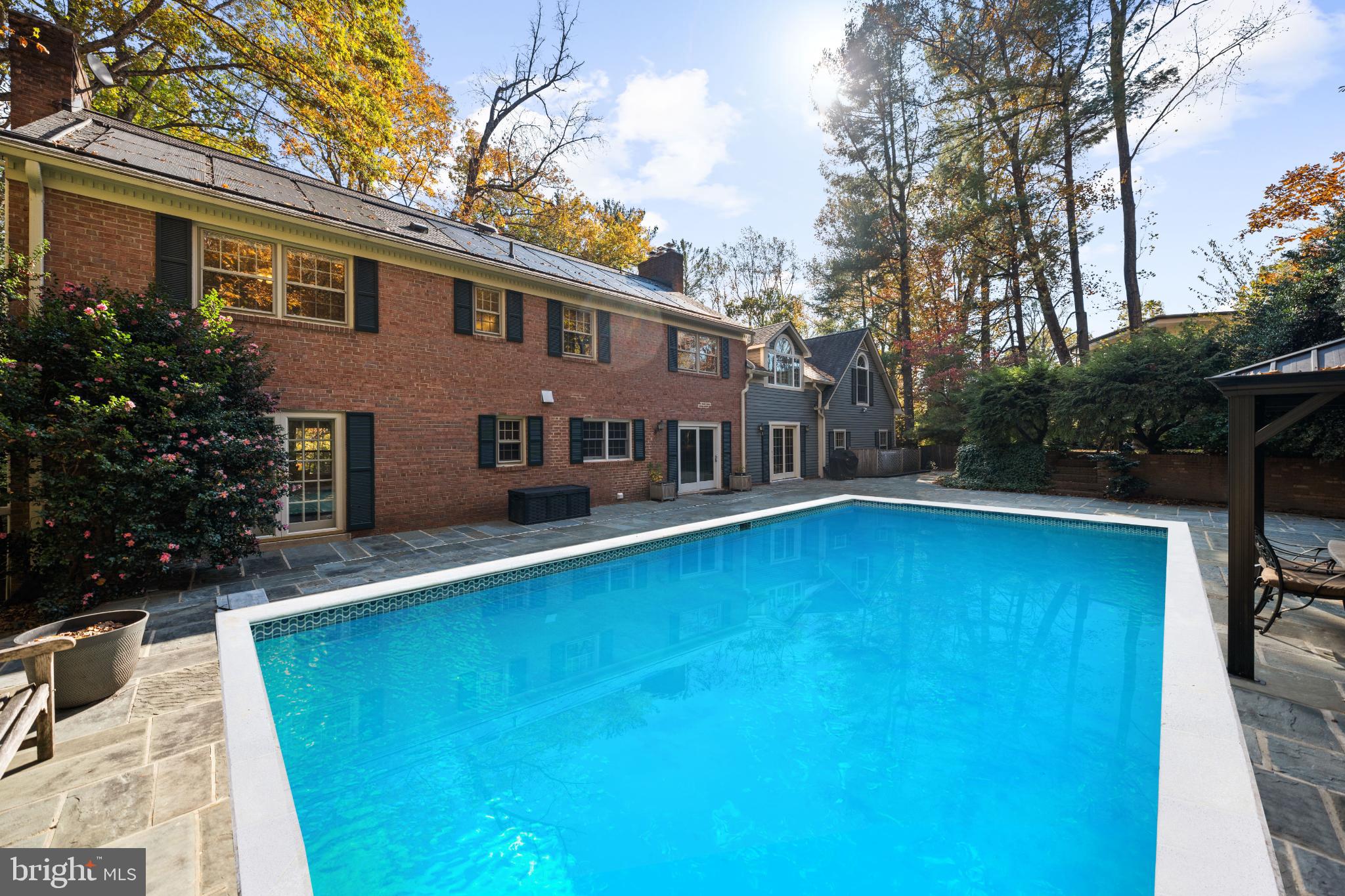 6710 Wemberly Way McLean, VA 22101 - Photo 40 of 46 Serene backyard oasis with sparkling pool.