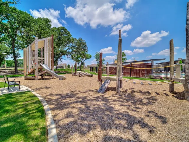 a view of a park with swings