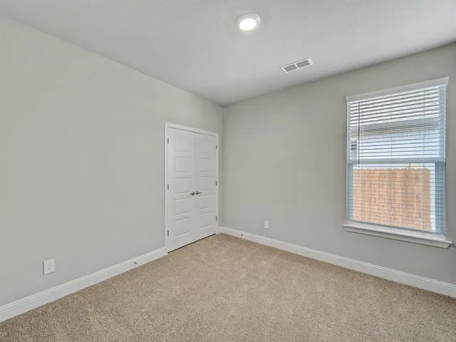 an empty room with a window