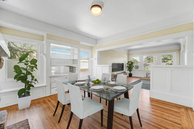 a view of a livingroom with furniture and wooden floor