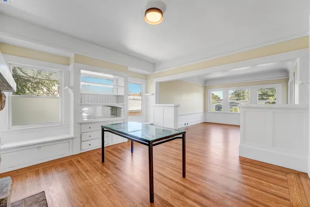 a view of a livingroom with furniture and a potted plant