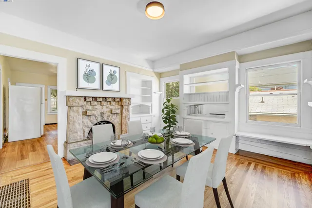 a view of a livingroom with furniture and a fireplace