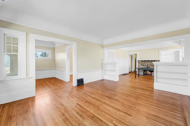 a view of an entryway with wooden floor and a potted plant