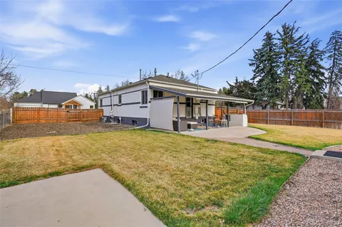 a view of a house with swimming pool