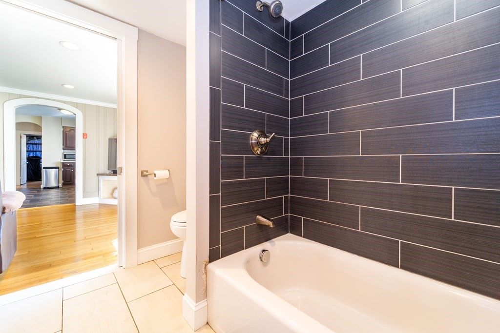 30 County Road Freetown, MA 02717 - Photo 20 of 35 a bathroom with a bathtub and a shower