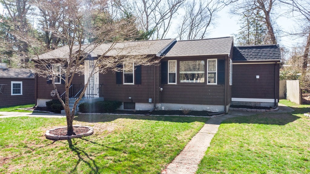 30 County Road Freetown, MA 02717 - Photo 3 of 35 a front view of a house with garden