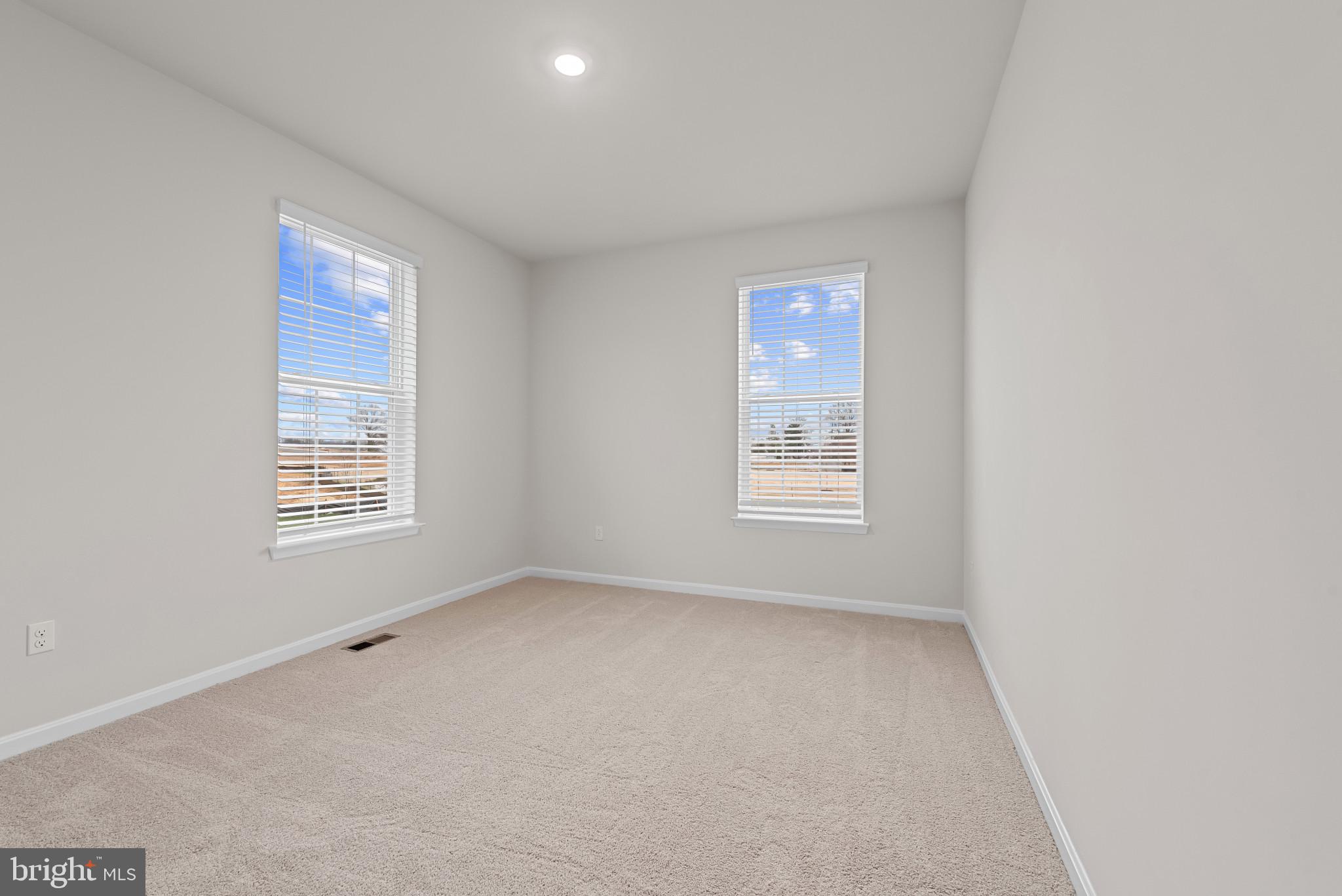 8103 Cypress Pt Drive Rosedale, MD 21237 - Photo 14 of 45 a view of an empty room with a window