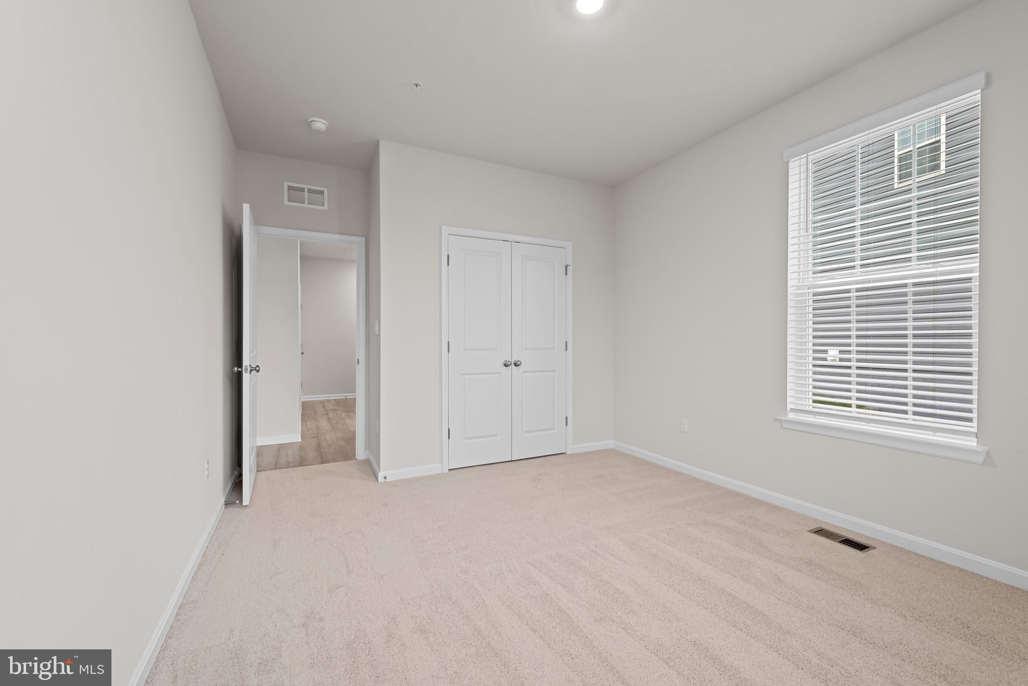 8103 Cypress Pt Drive Rosedale, MD 21237 - Photo 15 of 45 a view of an empty room with a window