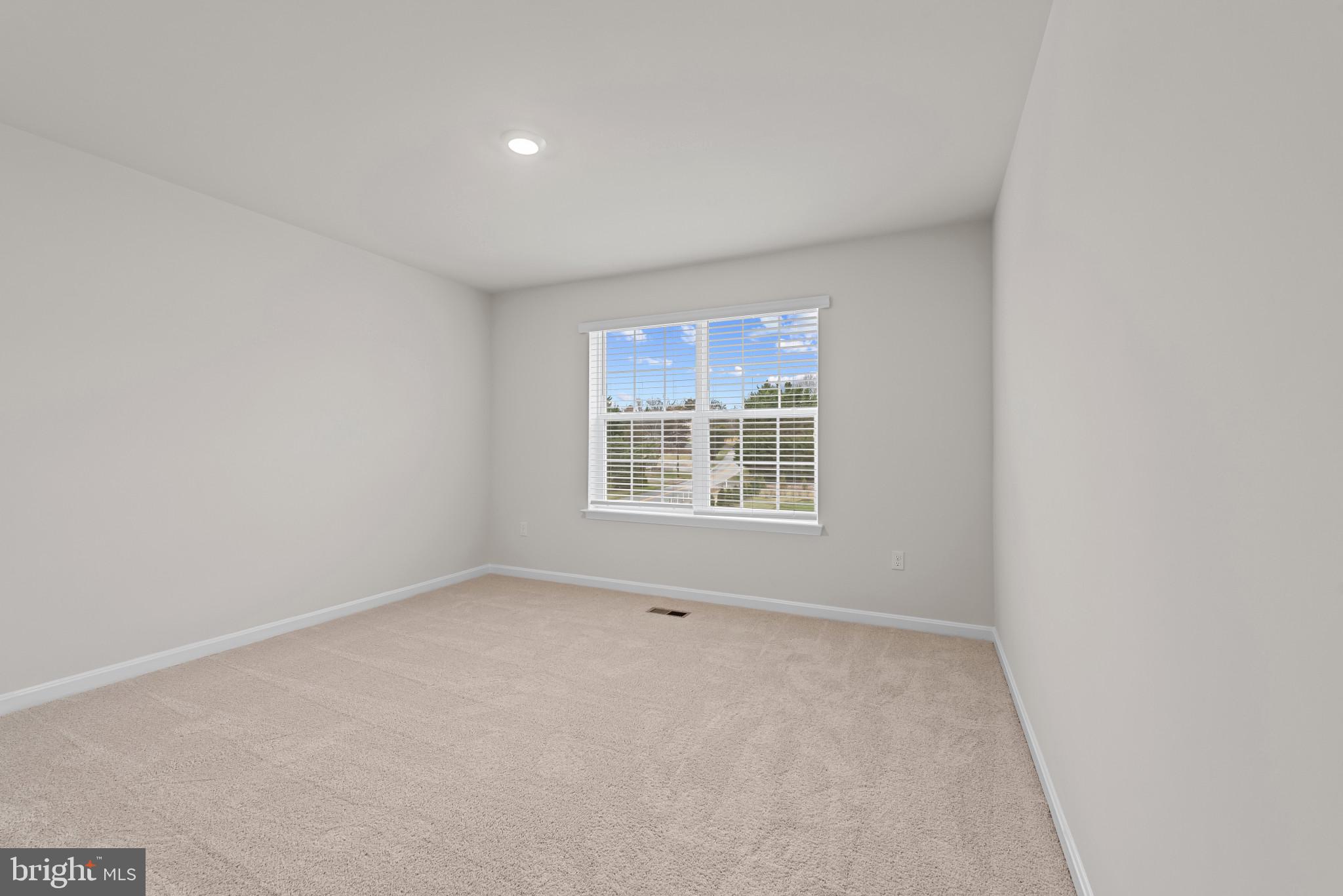 8103 Cypress Pt Drive Rosedale, MD 21237 - Photo 17 of 45 an empty room with windows