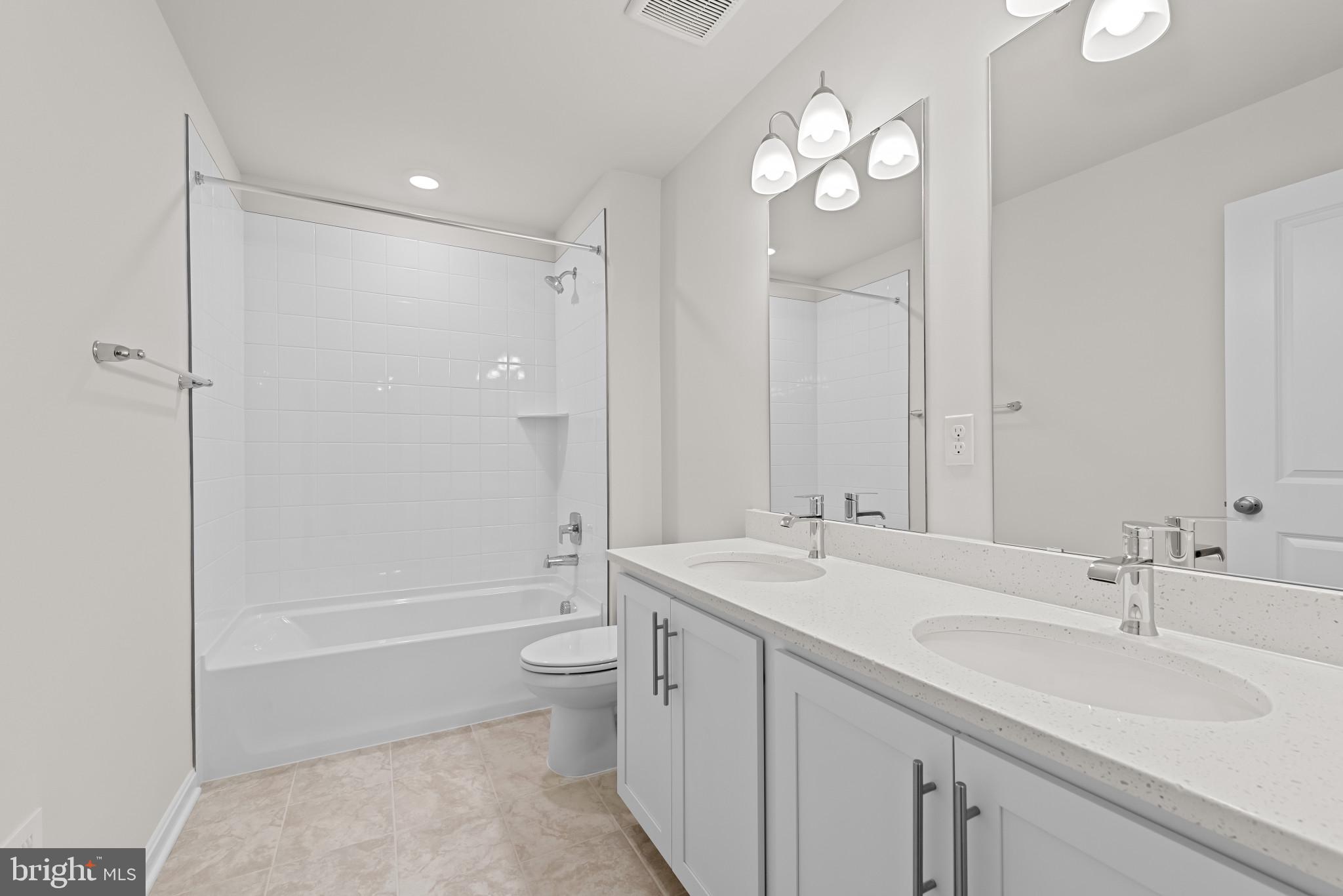 8103 Cypress Pt Drive Rosedale, MD 21237 - Photo 20 of 45 a bathroom with a double vanity sink mirror double and bathtub
