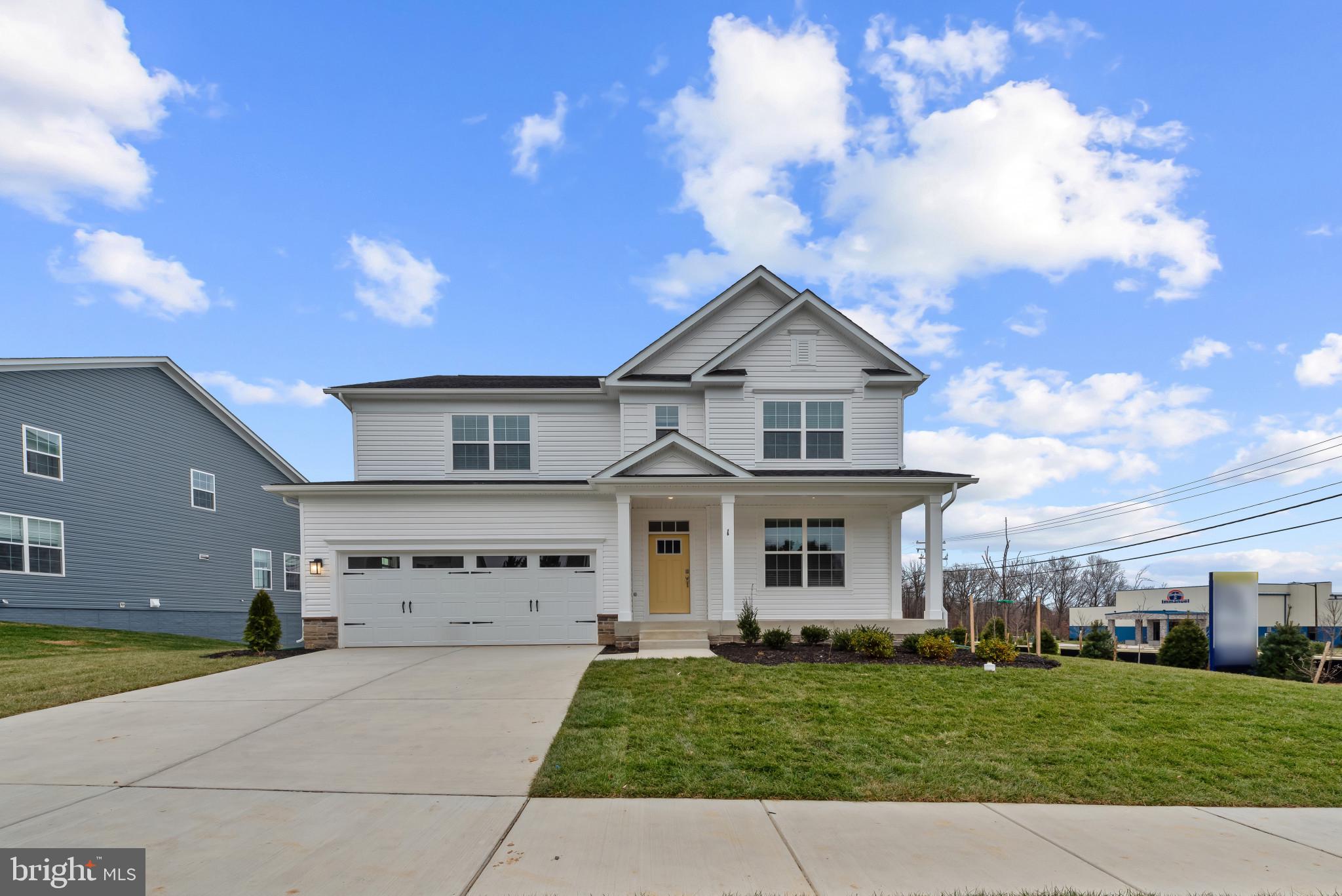 8103 Cypress Pt Drive Rosedale, MD 21237 - Photo 2 of 45 a front view of a house with a garden