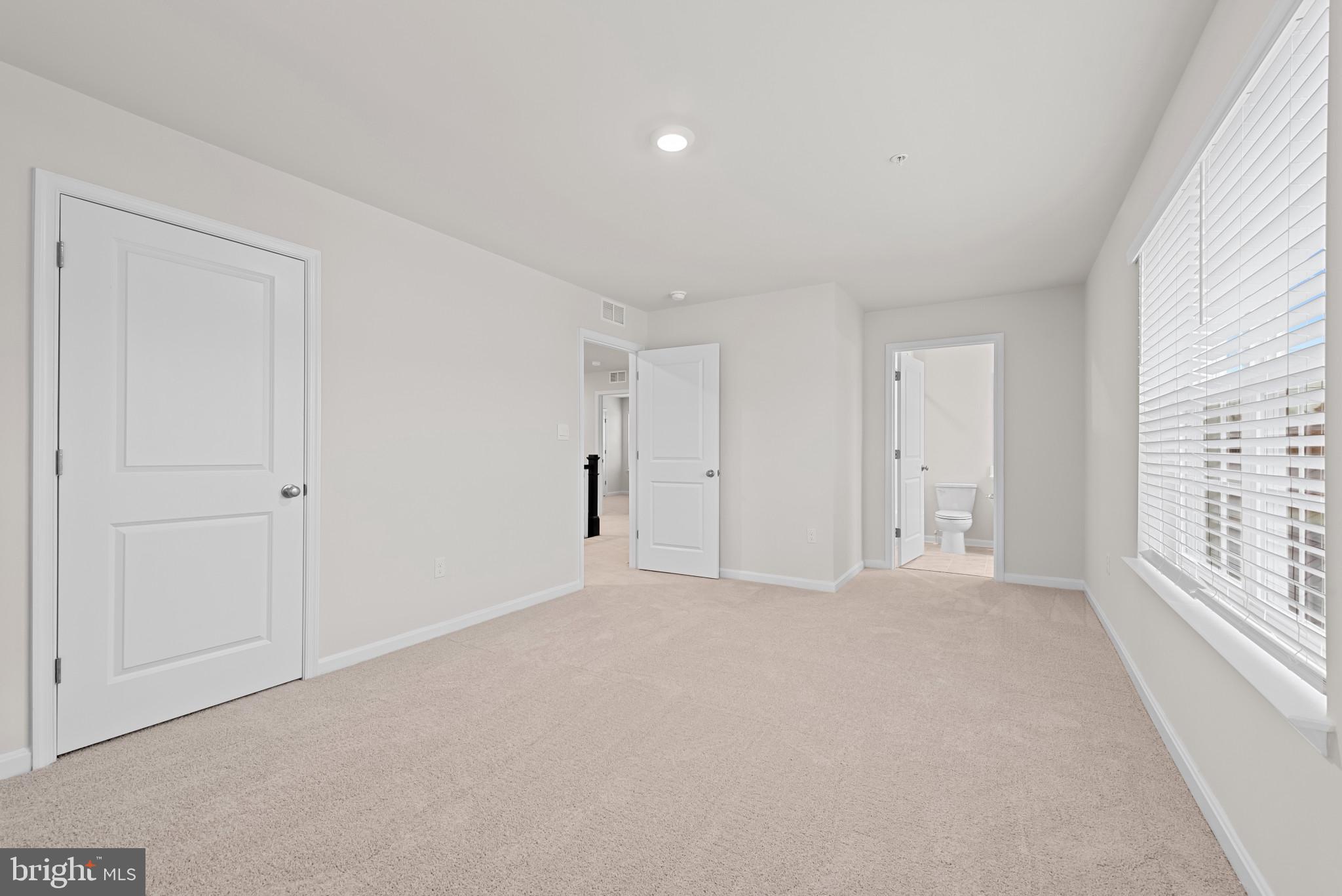 8103 Cypress Pt Drive Rosedale, MD 21237 - Photo 22 of 45 a view of an empty room with a window