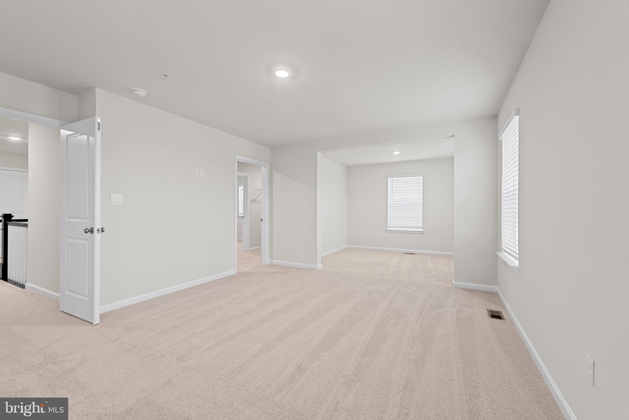 8103 Cypress Pt Drive Rosedale, MD 21237 - Photo 25 of 45 a view of an empty room with a window