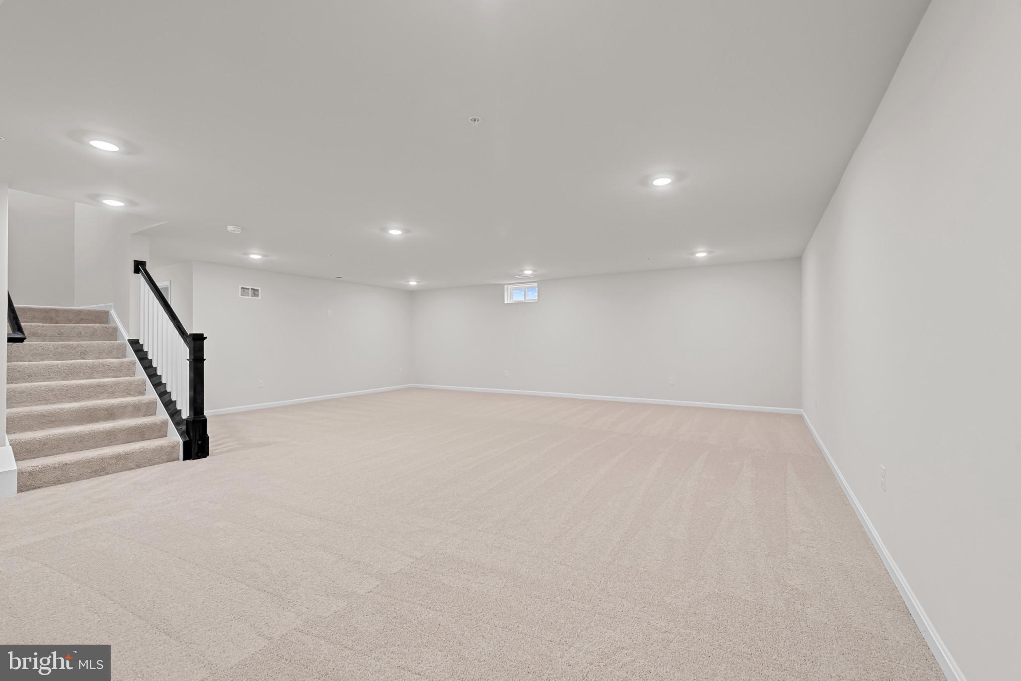 8103 Cypress Pt Drive Rosedale, MD 21237 - Photo 29 of 45 a view of an empty room with wooden floor