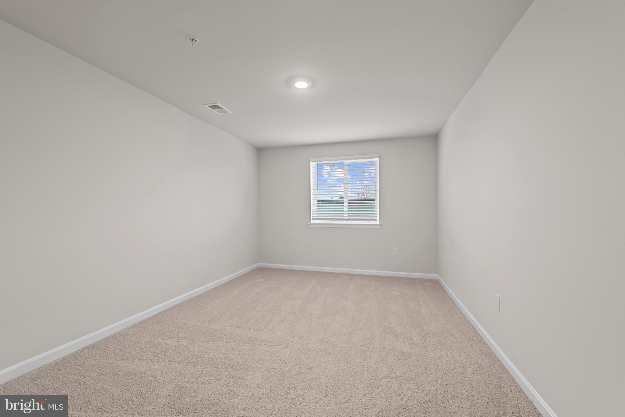 8103 Cypress Pt Drive Rosedale, MD 21237 - Photo 31 of 45 an empty room with a window