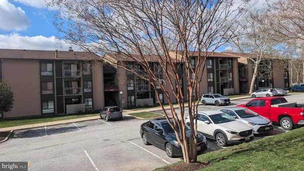 a view of a house with backyard porch and sitting area