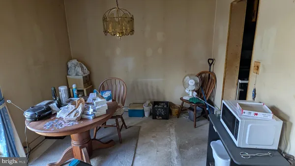 a view of a workspace with furniture