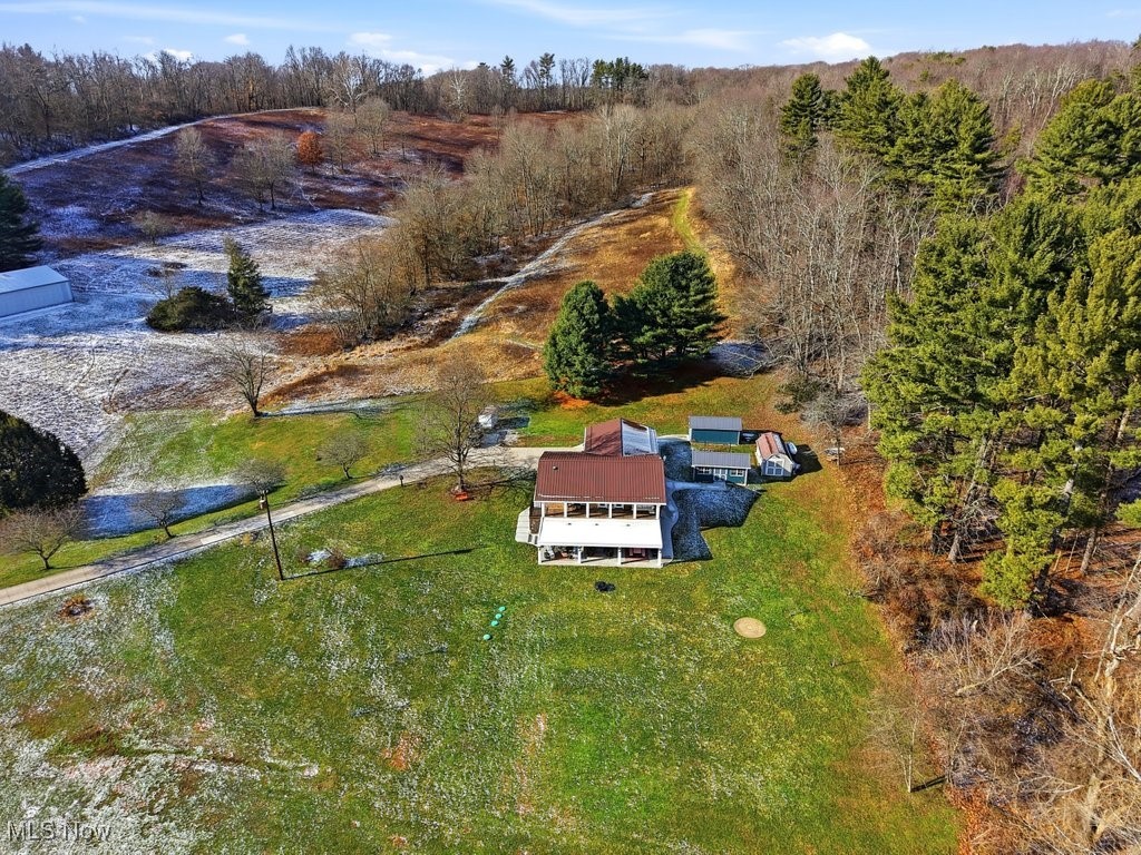 1430 Magnolia Road Southwest Dellroy, OH 44620 - Photo 44 of 50 Sweeping aerial view highlighting the generous lot size and peaceful, natural setting.
