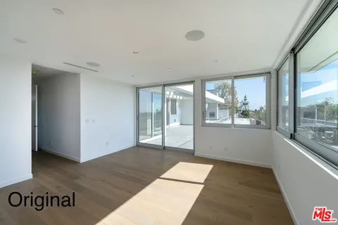 a view of a room with an entryway