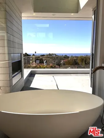 a picture of a room with a table and chairs
