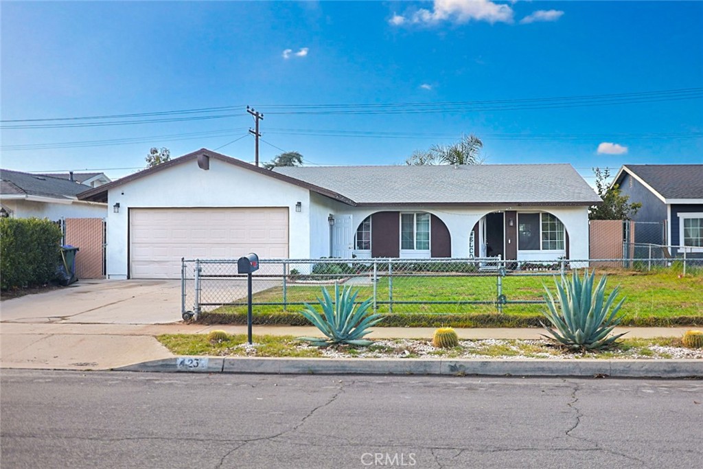 425 East King Street Rialto, CA 92376 - Photo 1 of 1 a front view of a house with a yard