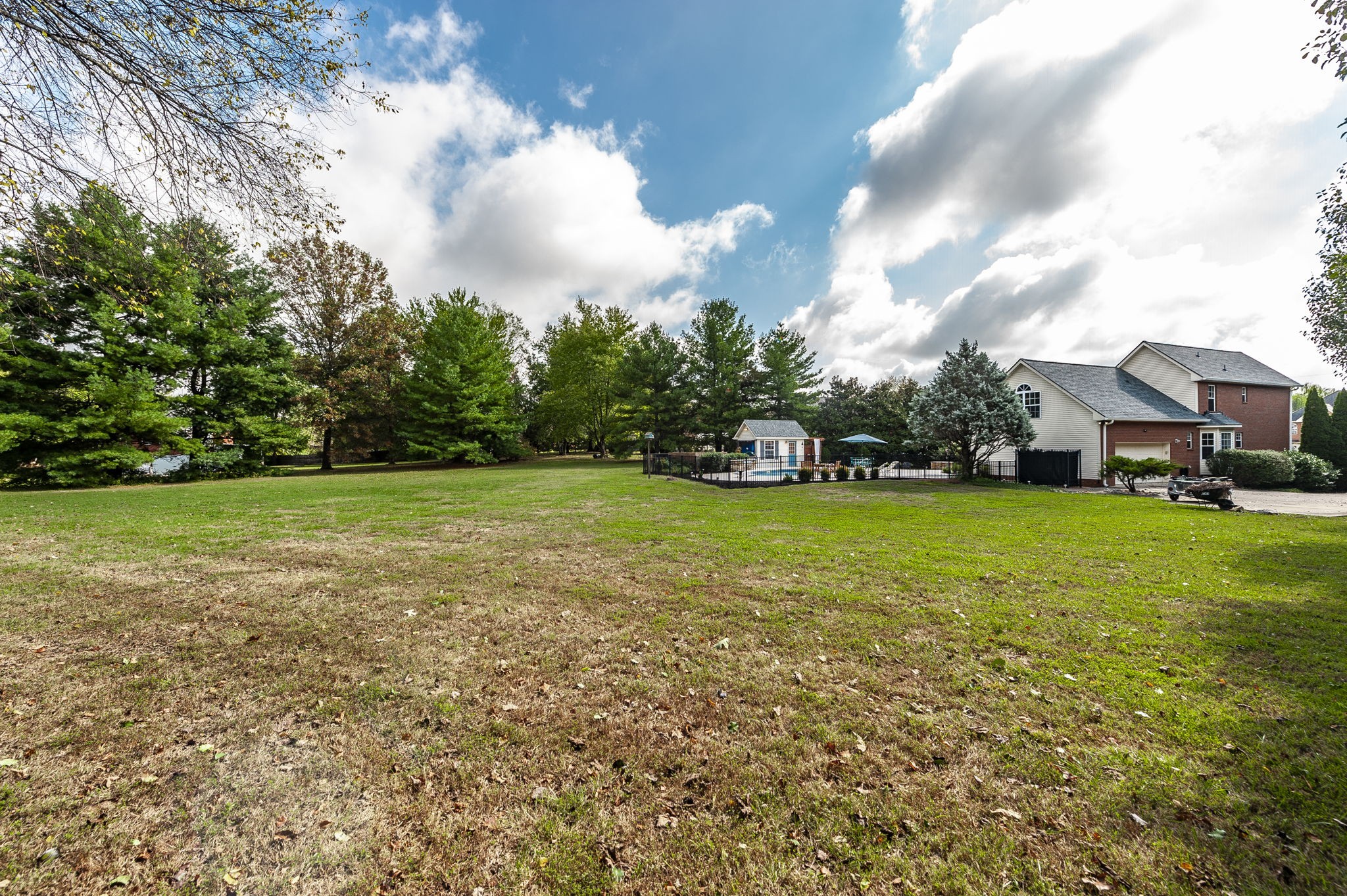 317 Cherry Lane White House, TN 37188 - Photo 22 of 70 a view of yard with swimming pool and green space