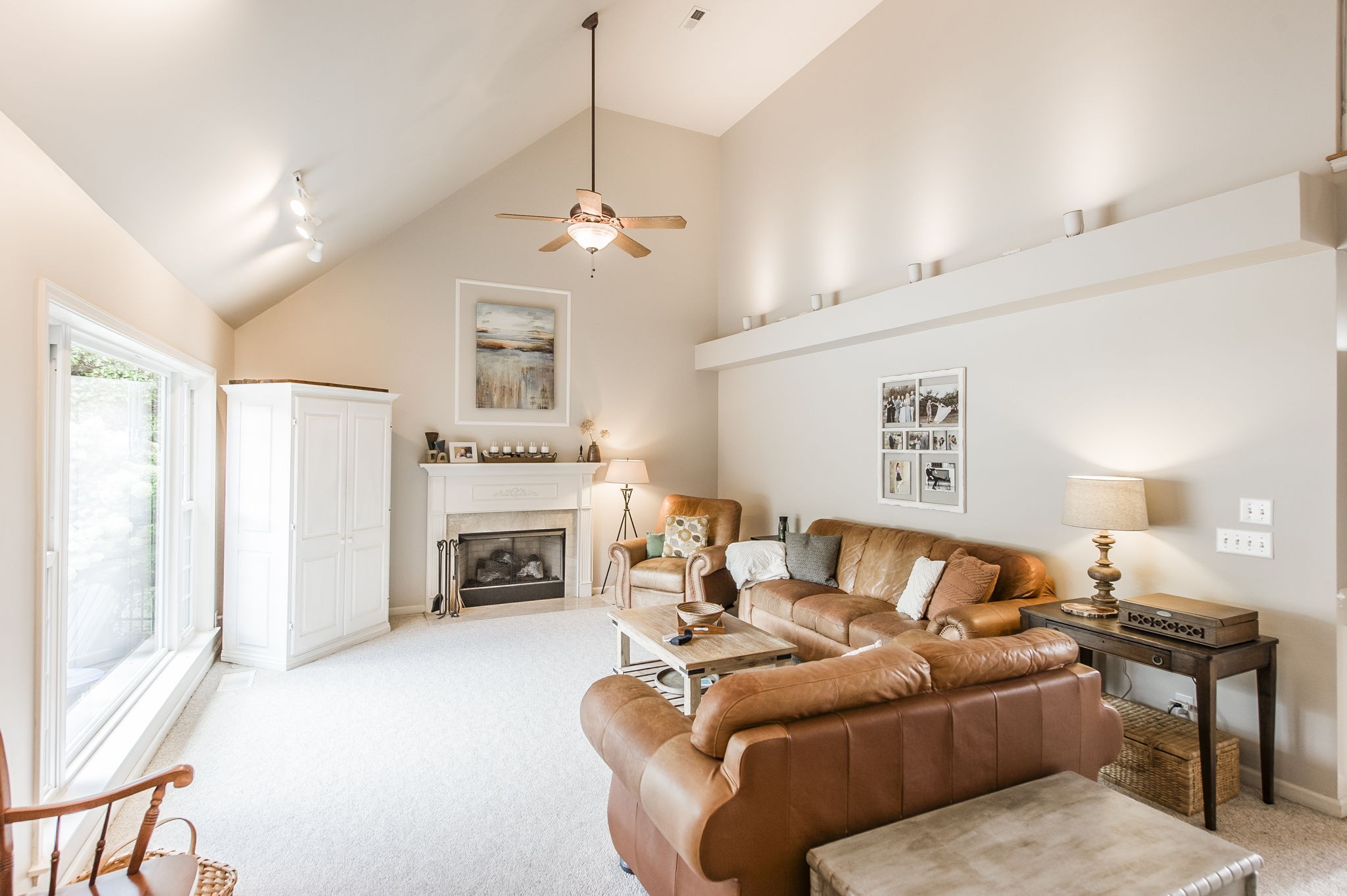 317 Cherry Lane White House, TN 37188 - Photo 27 of 70 a living room with furniture a fireplace and a flat screen tv