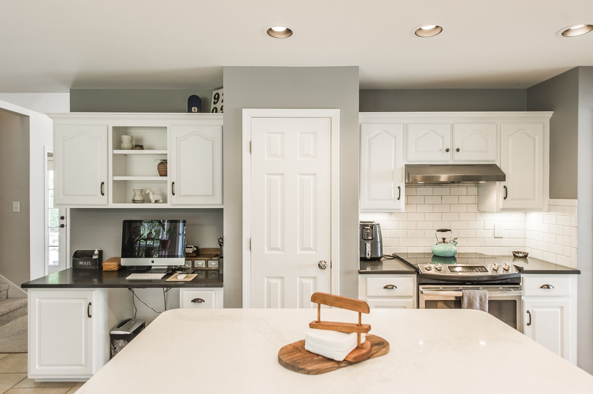 317 Cherry Lane White House, TN 37188 - Photo 42 of 70 a kitchen with stainless steel appliances kitchen island granite countertop a sink and cabinets