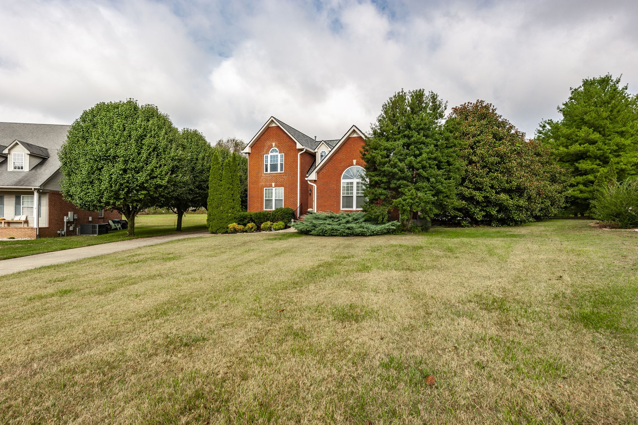 317 Cherry Lane White House, TN 37188 - Photo 5 of 70 a front view of a house with a yard