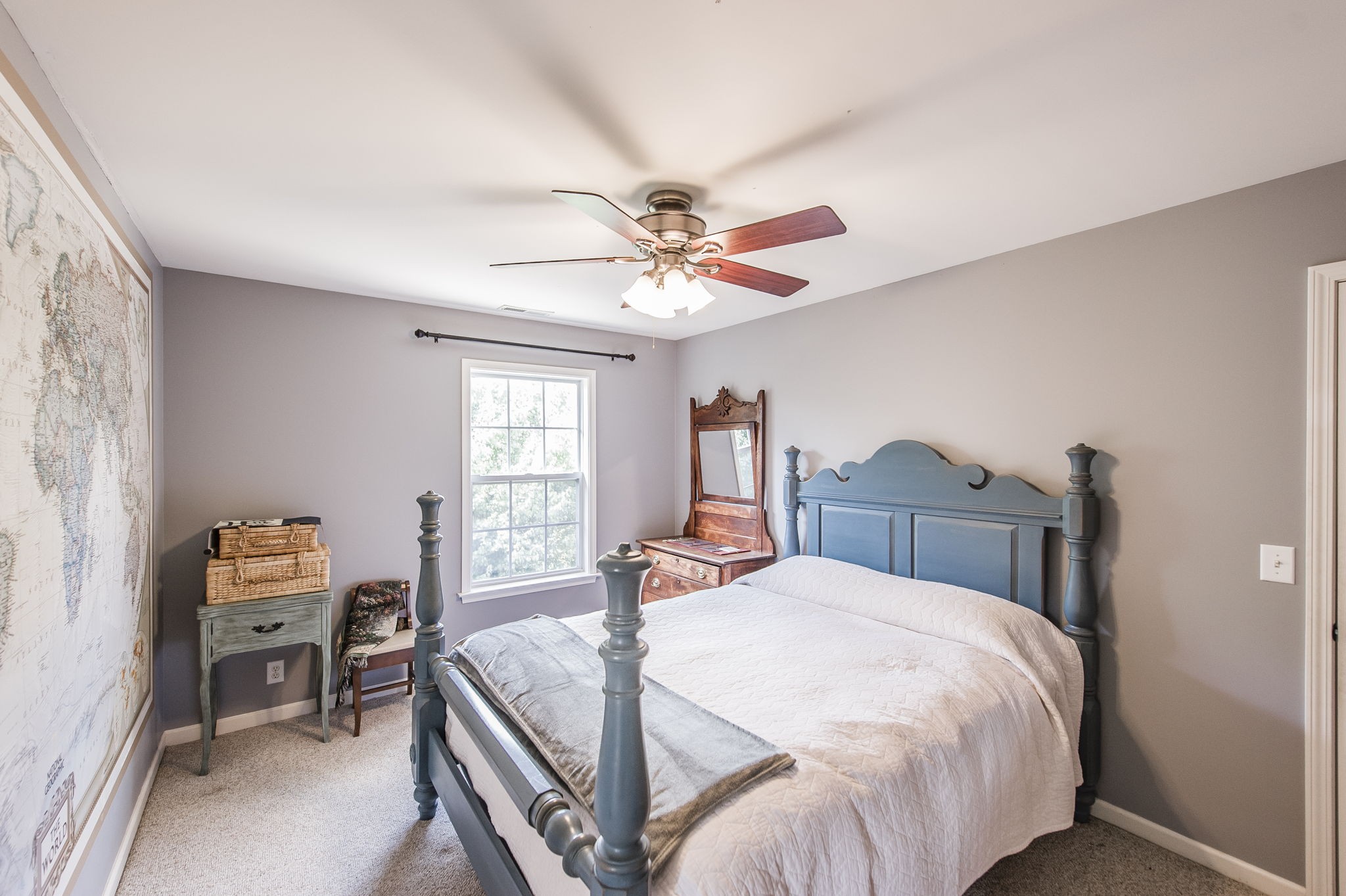 317 Cherry Lane White House, TN 37188 - Photo 58 of 70 a bedroom with a bed and a chandelier