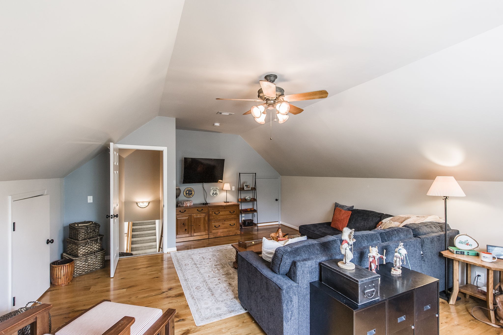 317 Cherry Lane White House, TN 37188 - Photo 65 of 70 a living room with furniture a chandelier and a dining table