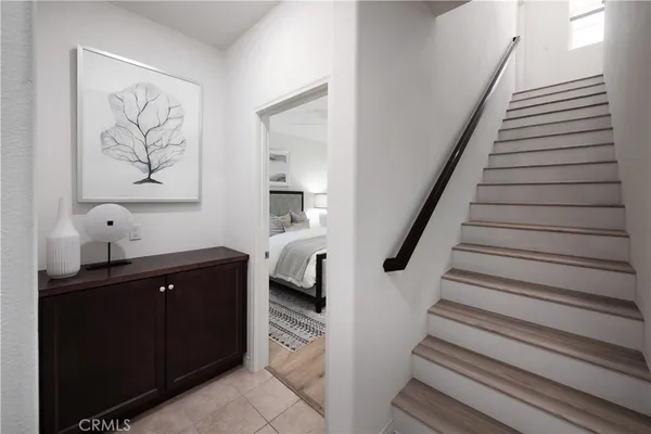 a spacious bathroom with a bathtub and a sink