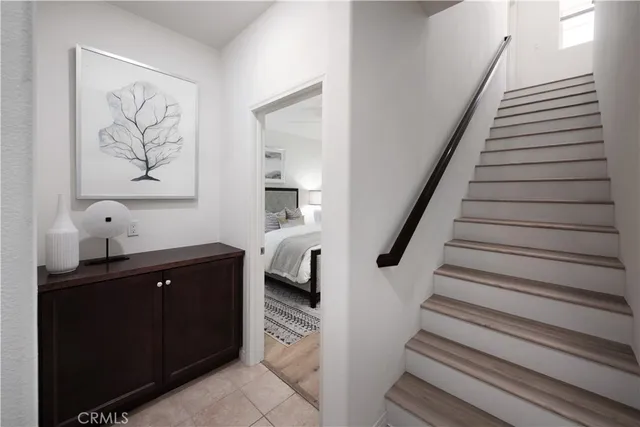 a spacious bathroom with a bathtub and a sink