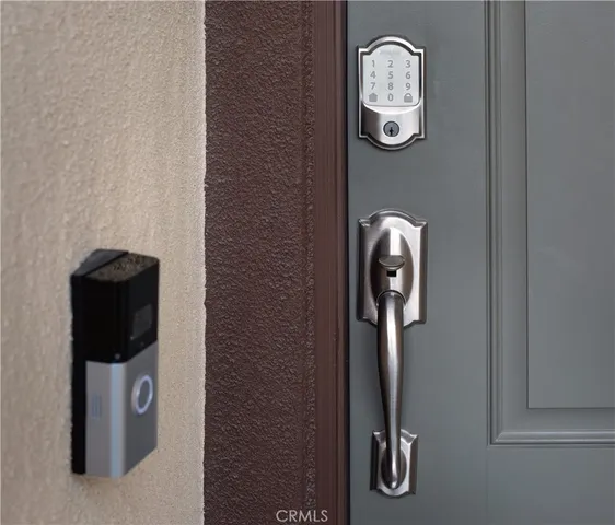 a front view of a entryway with wooden floor