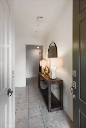 a kitchen with a sink cabinets and utility room
