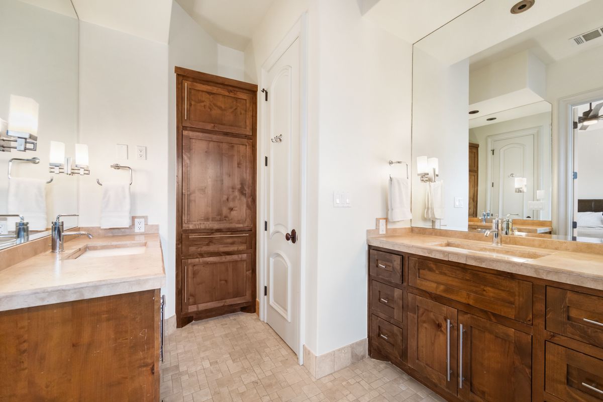 2002 Kinney Avenue, Unit A Austin, TX 78704 - Photo 16 of 26 a bathroom with a sink double vanity and a mirror