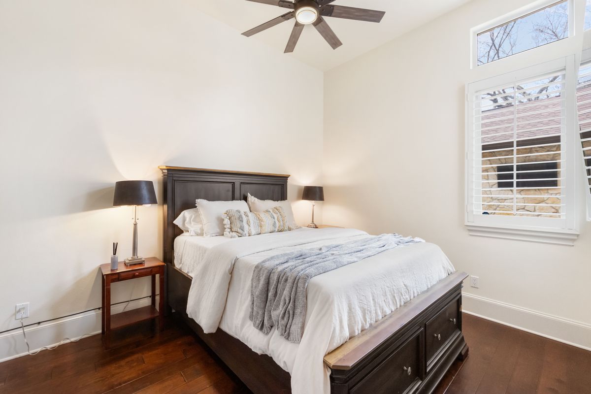 2002 Kinney Avenue, Unit A Austin, TX 78704 - Photo 20 of 26 a bedroom with a bed and window