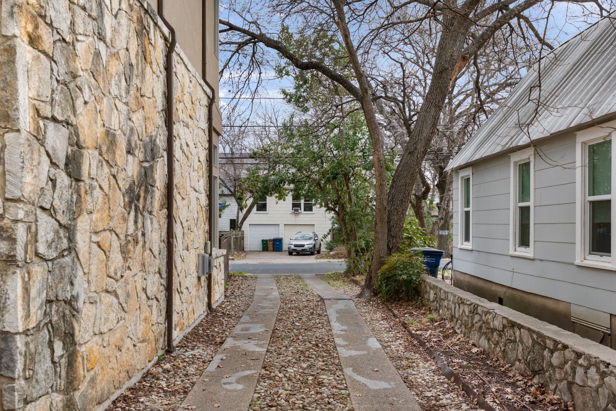 2002 Kinney Avenue, Unit A Austin, TX 78704 - Photo 23 of 26 a front view of a house with garden