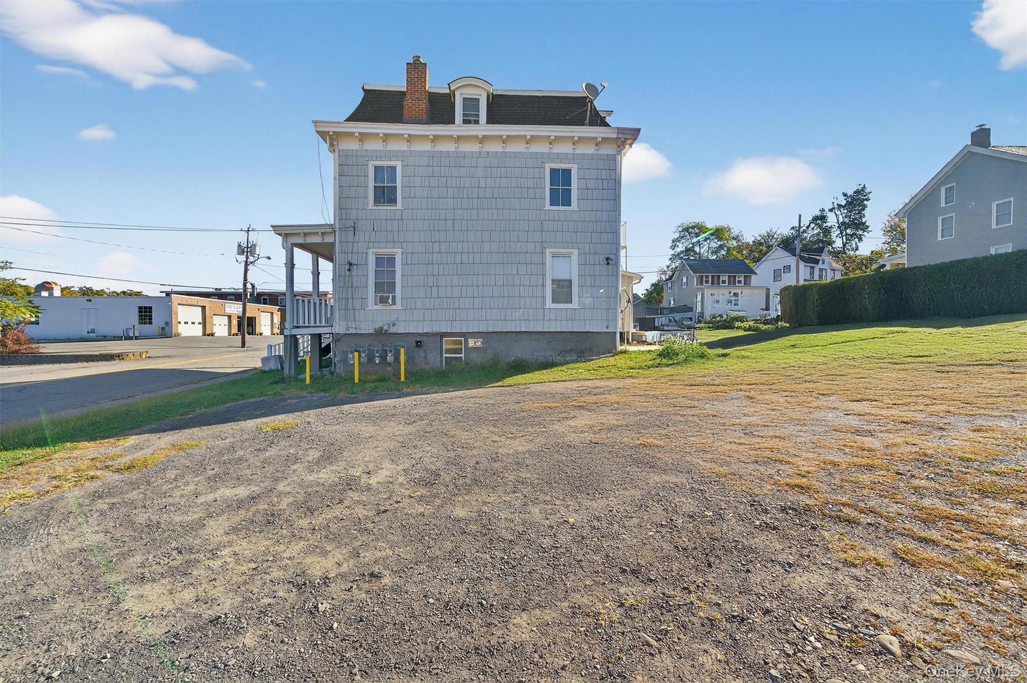 239 West Main Street, Unit 3 Goshen, NY 10924 - Photo 13 of 18 a view of an house with backyard and trees