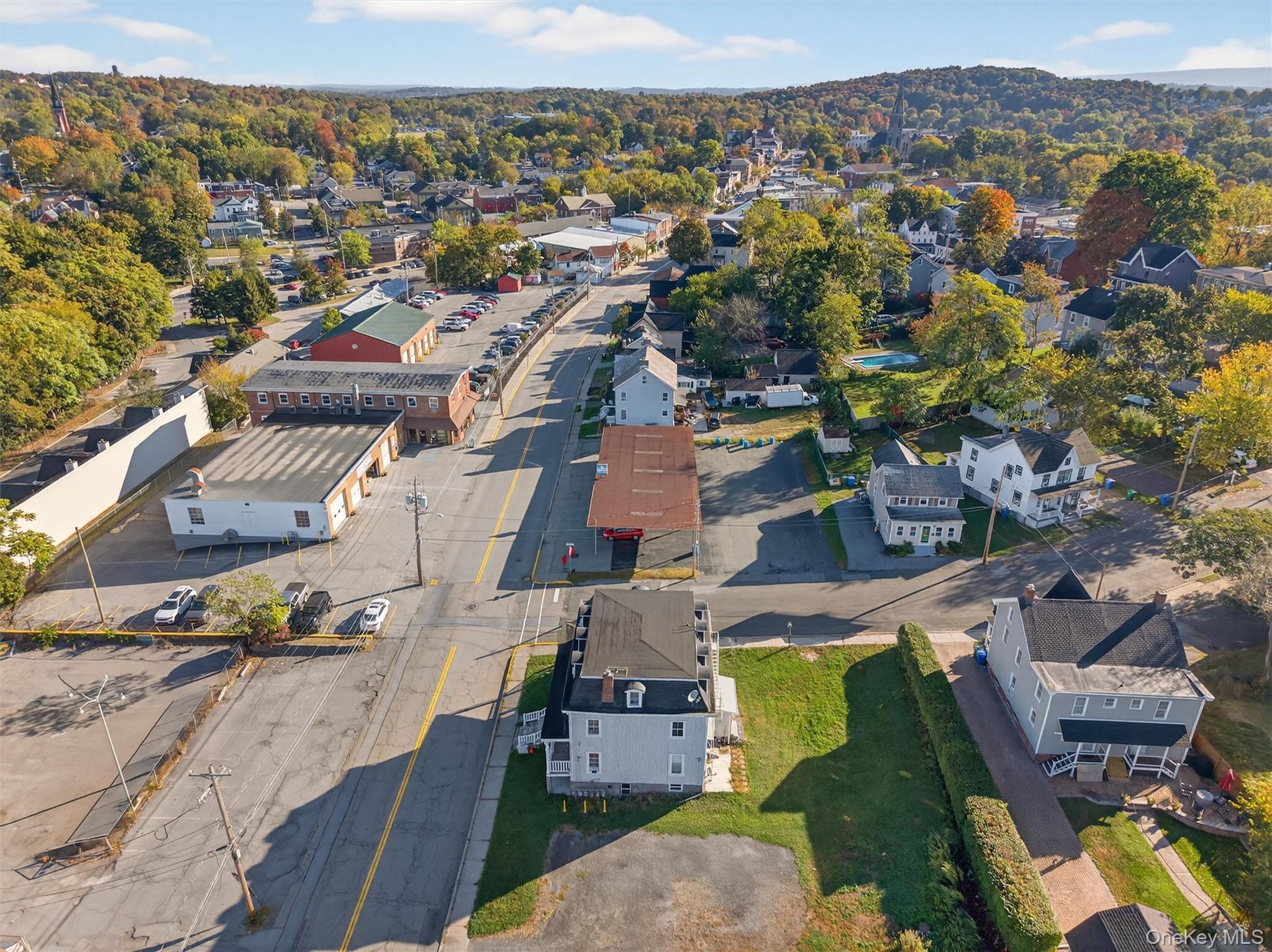 239 West Main Street, Unit 3 Goshen, NY 10924 - Photo 14 of 18 an aerial view of residential houses with outdoor space