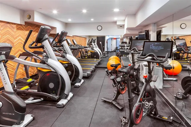 a view of a room with gym equipment