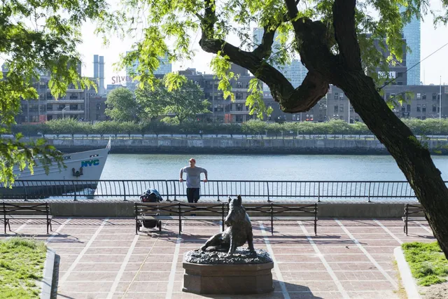 a view of house with outdoor seating area