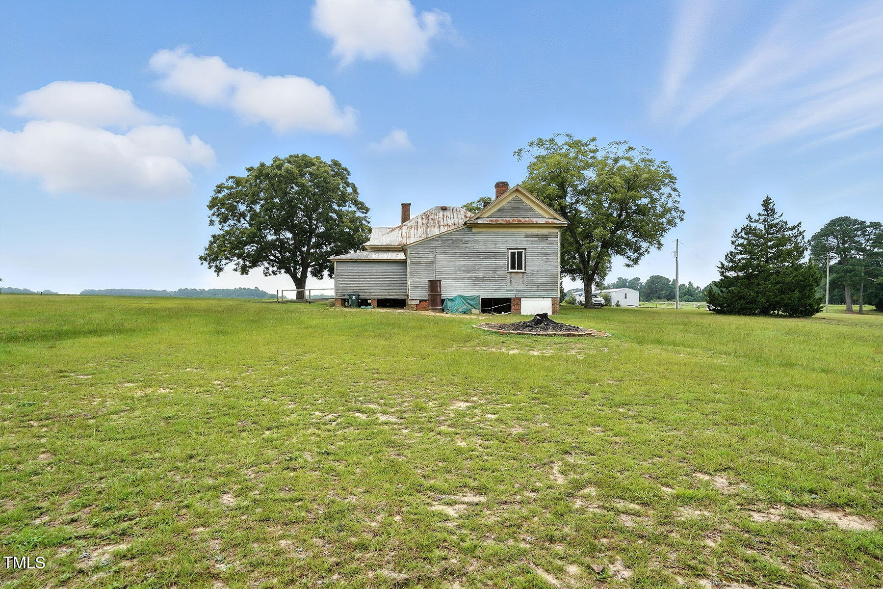 1200 D Morgan Road Benson, NC 27504 - Photo 12 of 35 a view of a house with a big yard