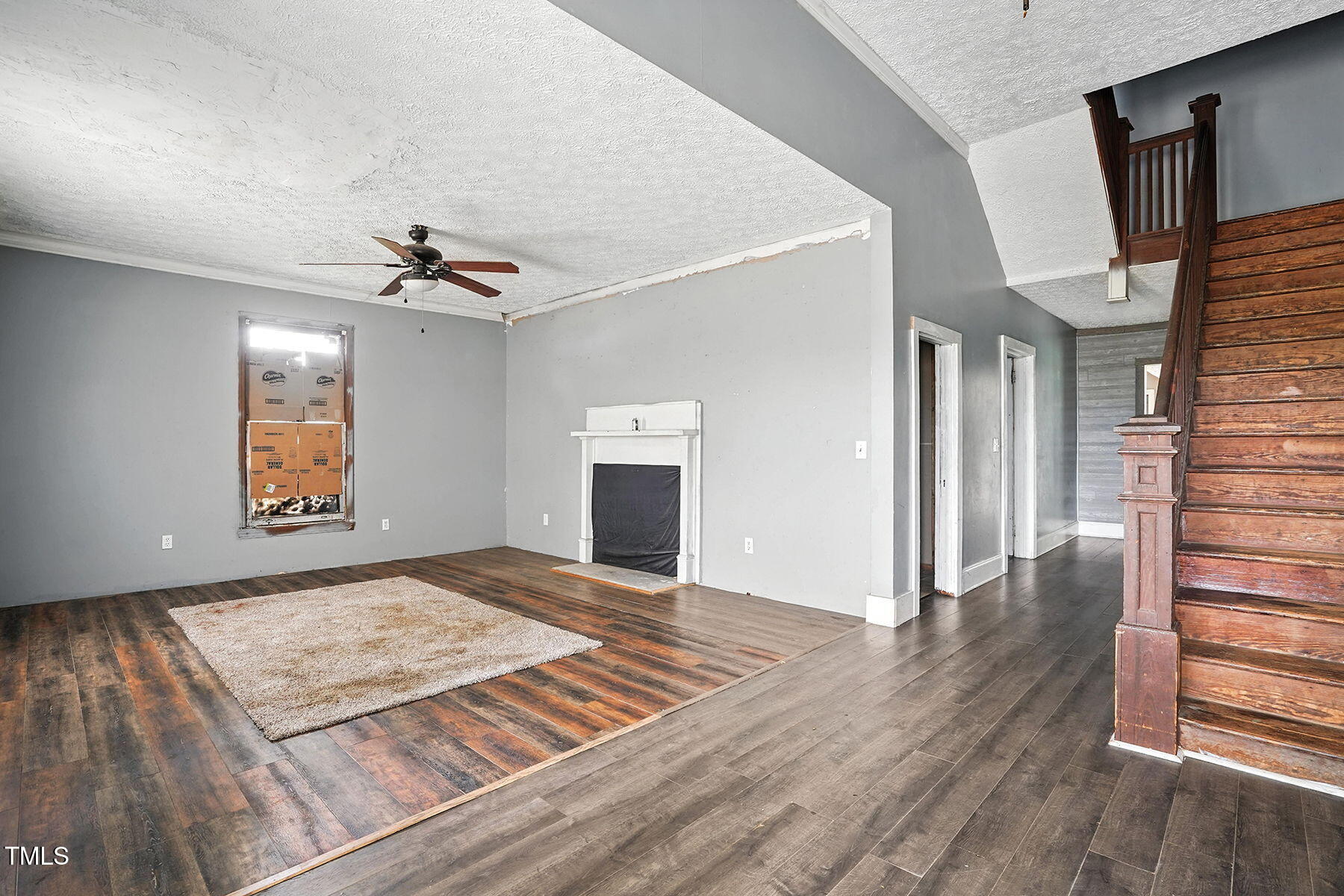 1200 D Morgan Road Benson, NC 27504 - Photo 15 of 35 a view of an empty room and window and wooden floor
