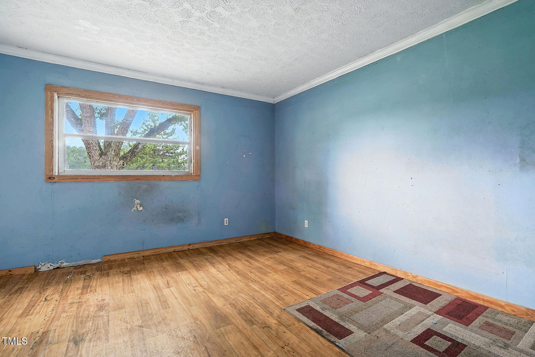 1200 D Morgan Road Benson, NC 27504 - Photo 19 of 35 an empty room with a window