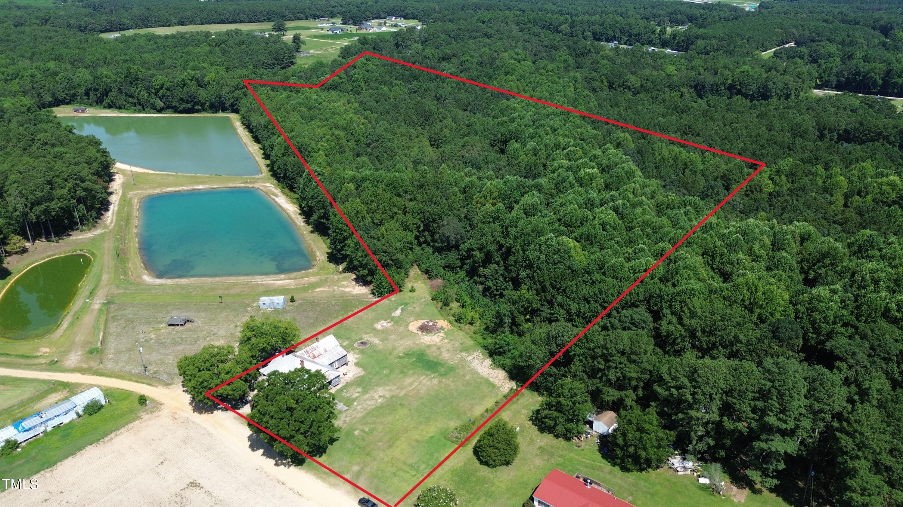 1200 D Morgan Road Benson, NC 27504 - Photo 2 of 35 an aerial view of a house