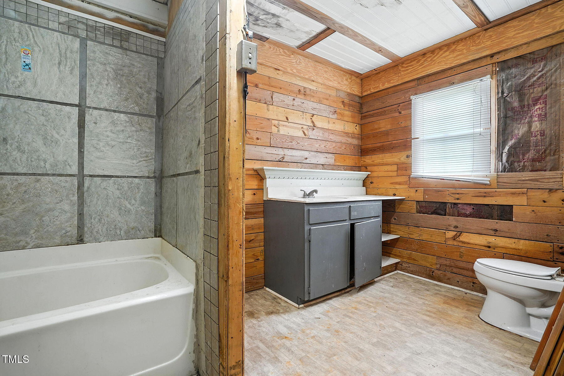 1200 D Morgan Road Benson, NC 27504 - Photo 23 of 35 a bathroom with a sink a toilet and bathtub