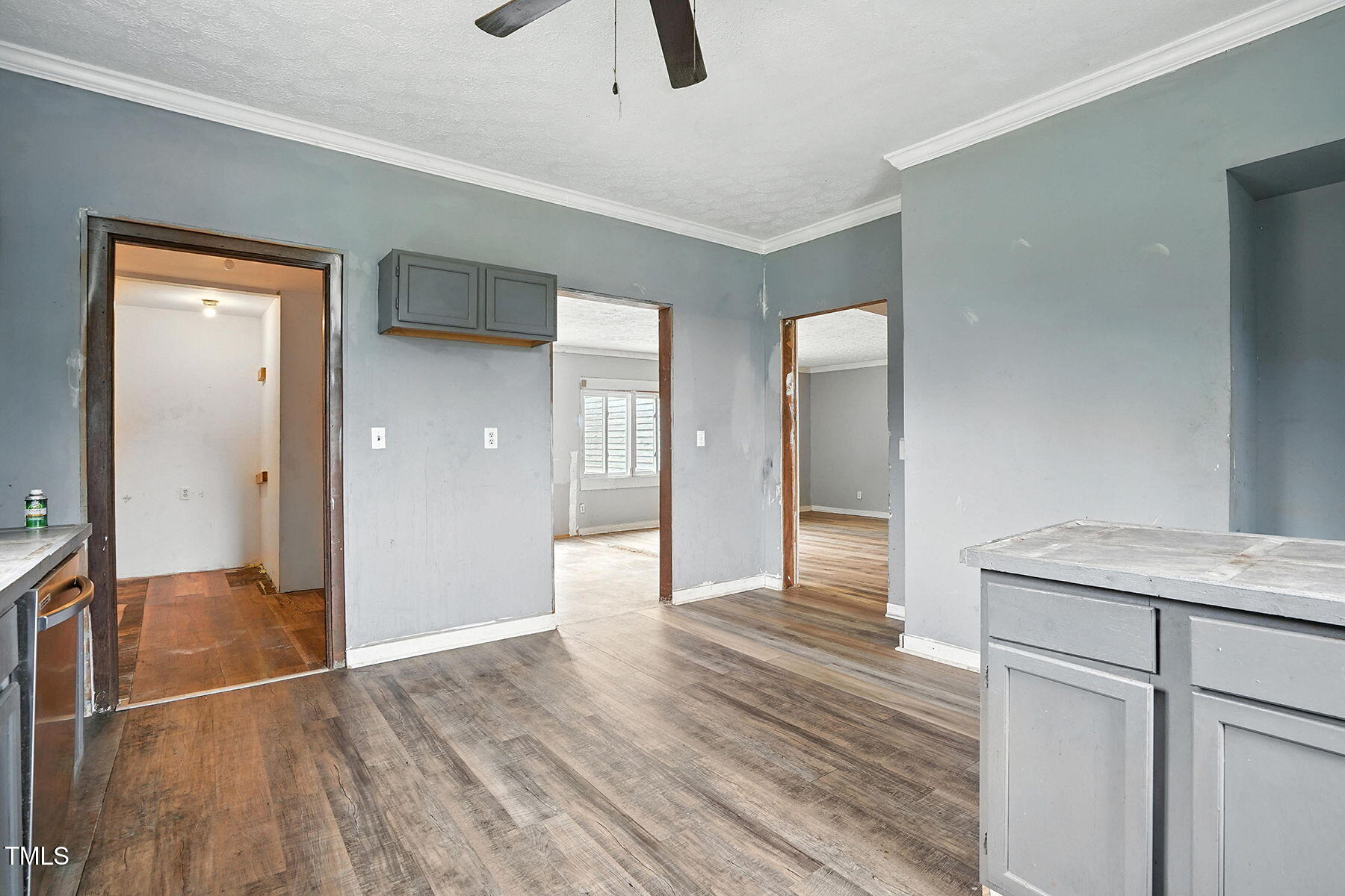 1200 D Morgan Road Benson, NC 27504 - Photo 30 of 35 a view of a hallway with wooden floor and a bathroom