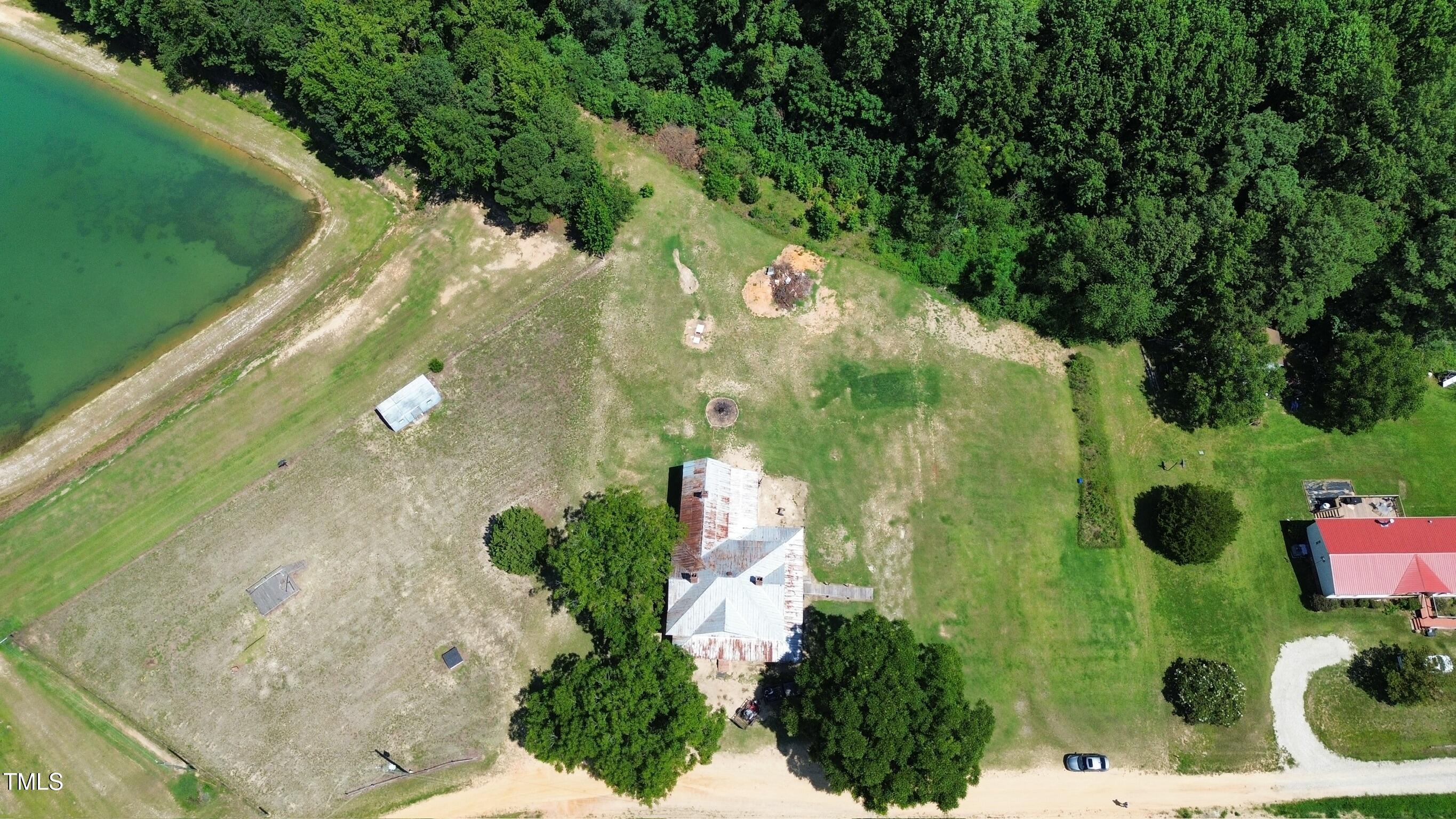 1200 D Morgan Road Benson, NC 27504 - Photo 4 of 35 an aerial view of a residential houses with outdoor space